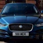 2020 Jaguar XE in dark blue parked in city lot
