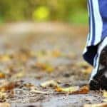 woman hiking on trail close of up gym shoes