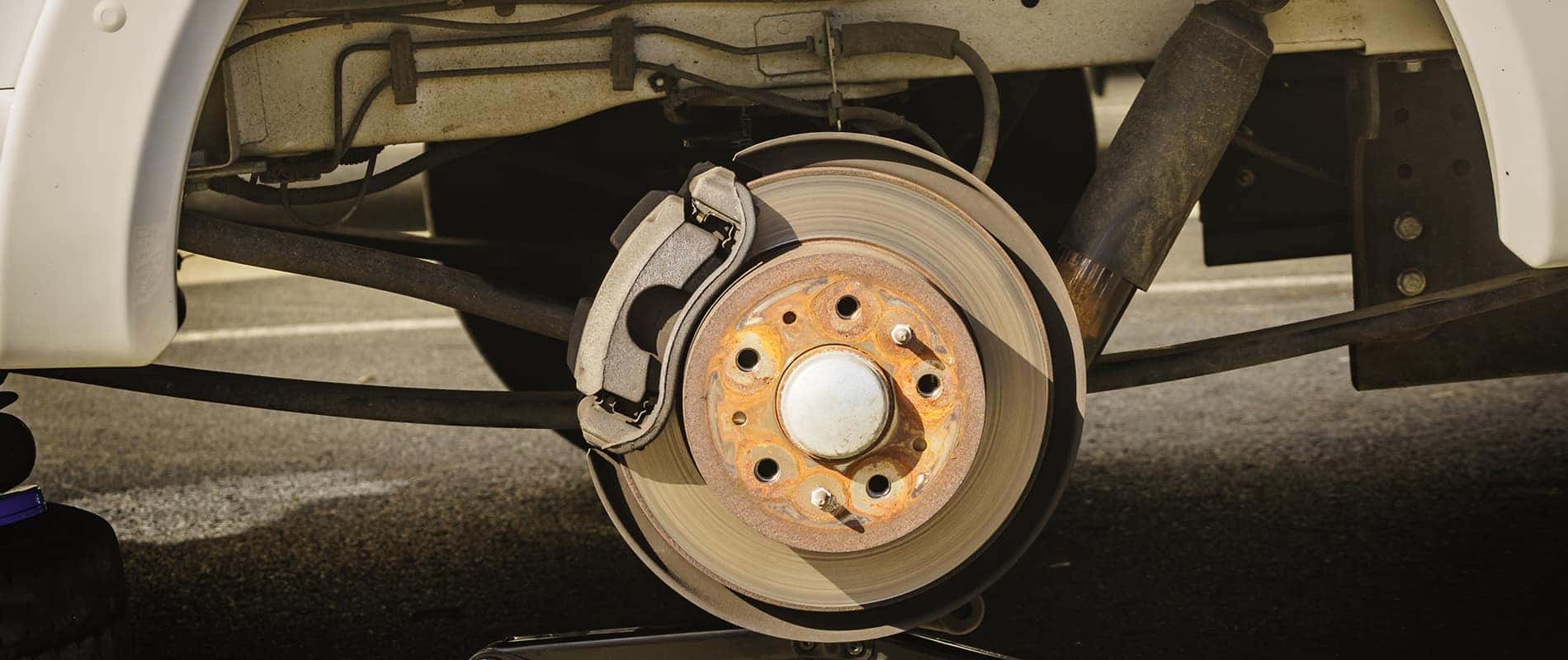 A vehicle receiving brake repair.