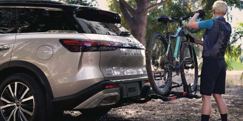 INFINITI QX60 towing a bike with a bike rack