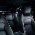 2019 jaguar xe 300 sport interior with black upholstery and yellow contrast stitching