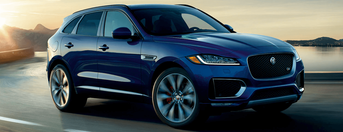 https://di-uploads-pod6.dealerinspire.com/jaguarmonmouth/uploads/2019/07/2019-jaguar-f-pace-blue-on-road.png