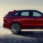 Red 2020 Jaguar F-PACE traveling through the desert