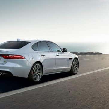 2019 Jaguar XF luxury sedan side rear view