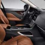 2019 jaguar f-pace interior view of front row with brown leather seats