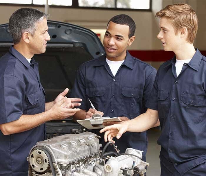 Mechanic working on car