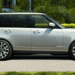 2020 Range Rover driving on suburban road