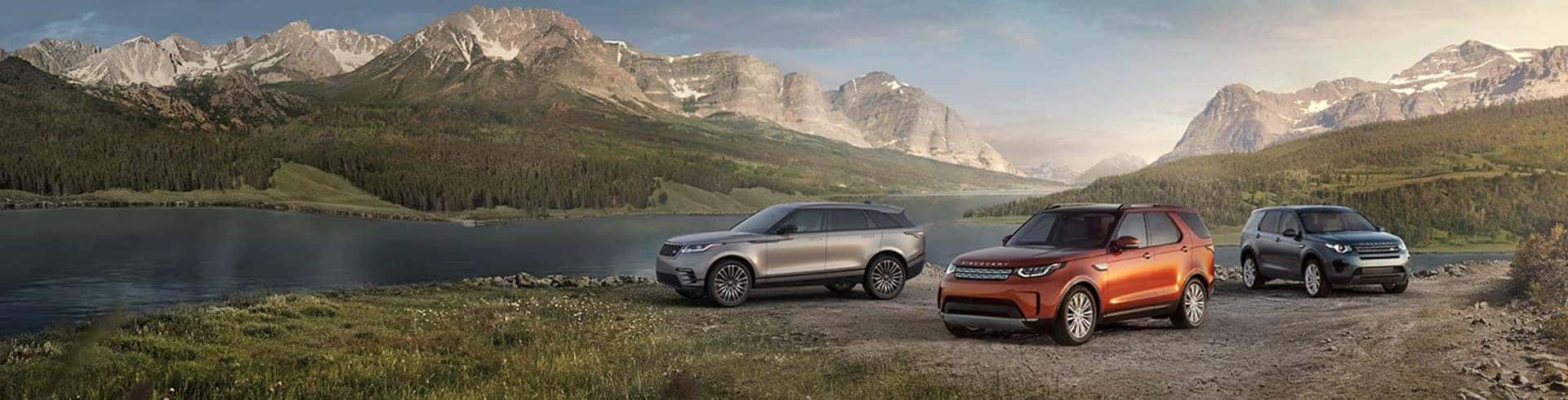2019 Land Rovers near a mountain lake