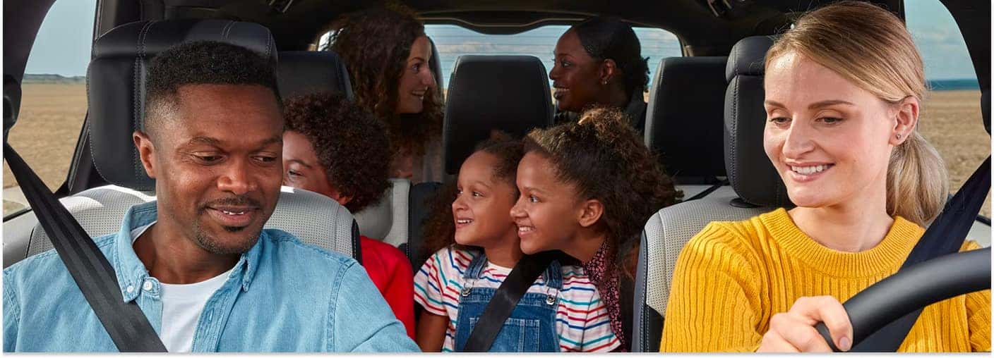 2026 Discovery Interior With Family Seated Inside