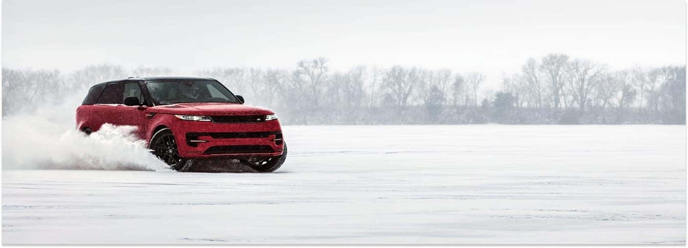 Red 2025 Range Rover Sport Off-Roading In The Snow