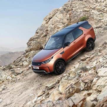 2019 Land Rover Discovery Off-Roading Down Rocky Mountain Hill