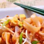 plate of tofu pad thai with chopsticks