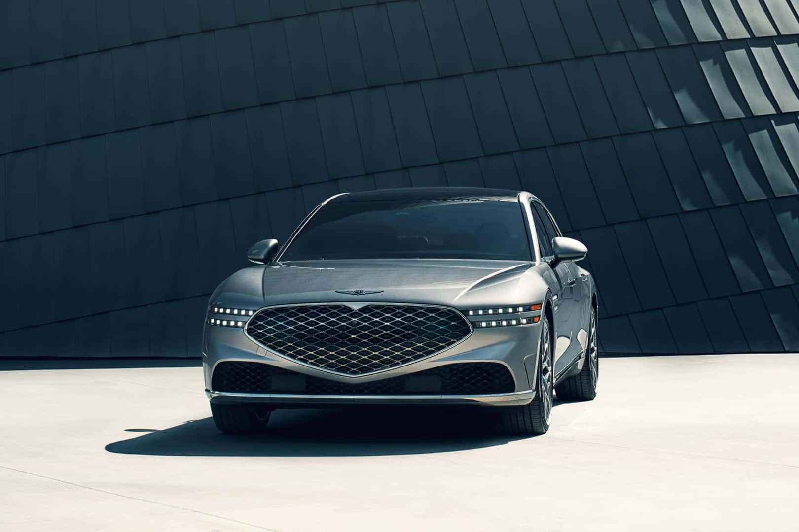 2026 genesis g90 parked in front of building