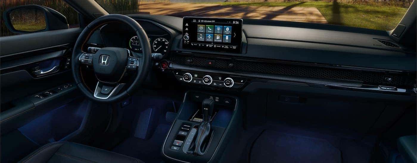 Blue ambient lighting in the cabin of a 2025 Honda CR-V for sale.