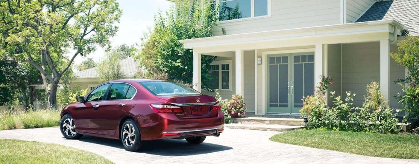 A maroon 2017 Honda Accord LX is shown parked on a driveway.