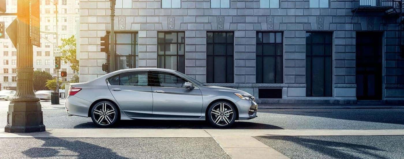 A silver 2017 Honda Accord Touring is shown on a city street after visiting a Honda dealer near Middletown.