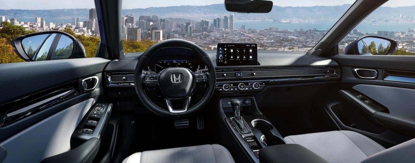 The grey interior of a 2025 Honda Civic for sale near Hartford.