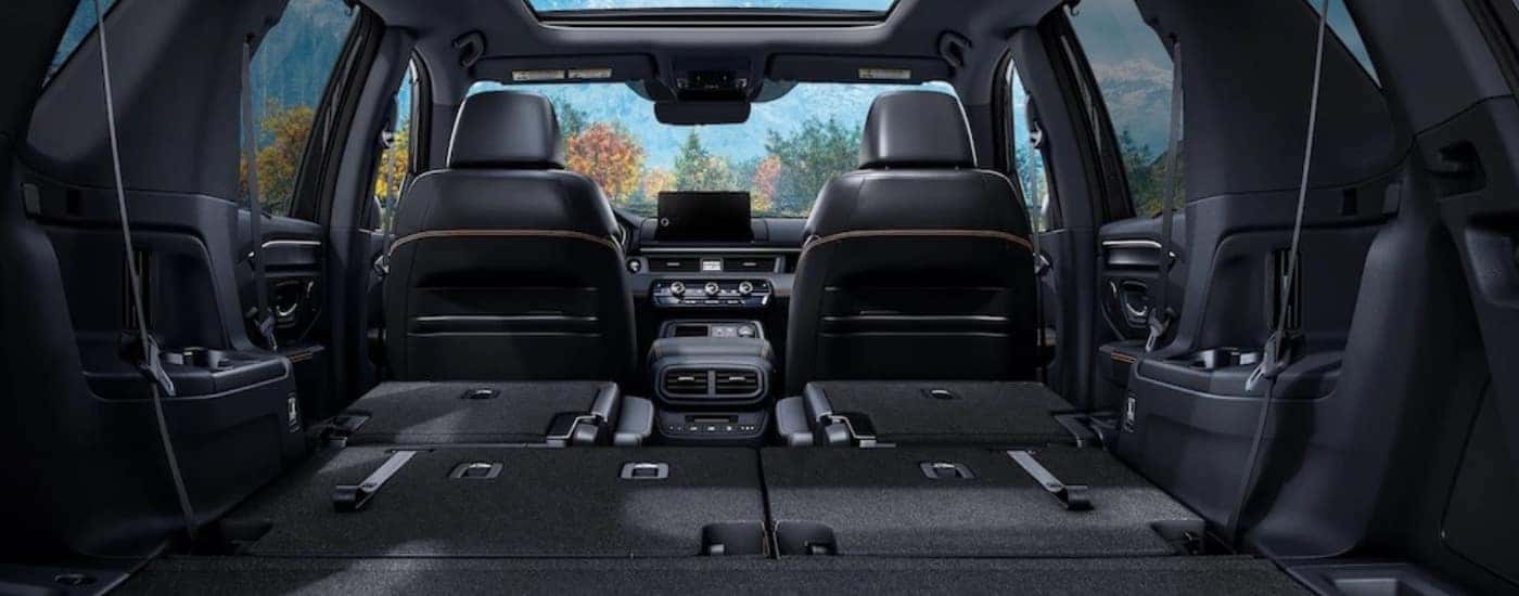 The black interior of a 2025 Honda Pilot.