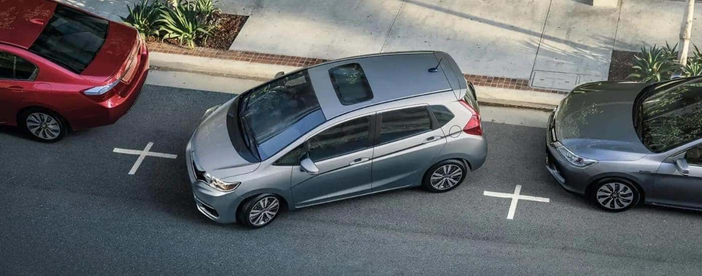 Silver 2020 Honda Fit parallel parking