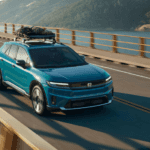 Blue 2026 Honda Prologue driving over a bridge