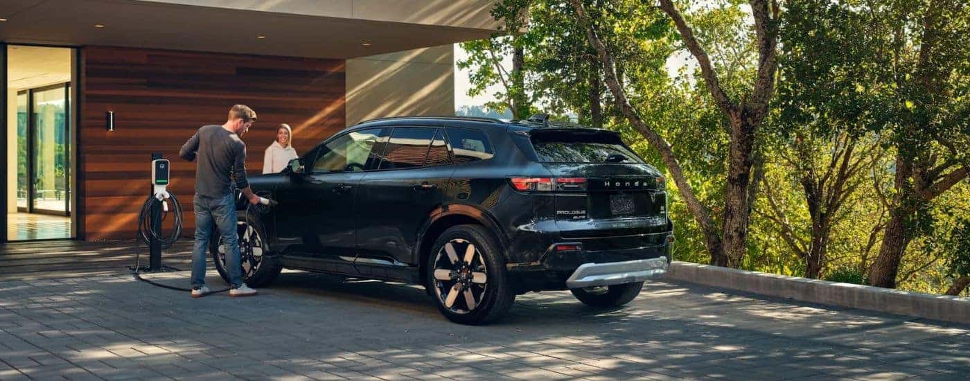Rear of a 2025 Honda Prologue Elite parked on a driveway.