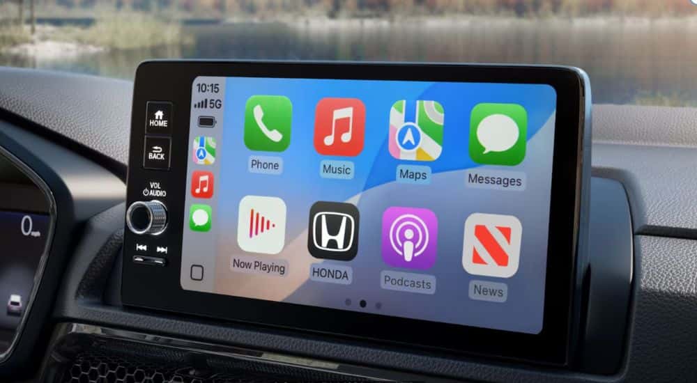 The infotainment display on a 2026 CR-V Sport Touring Hybrid with Apple Car Play.