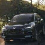 Gray 2027 Honda HR-V driving offroad.