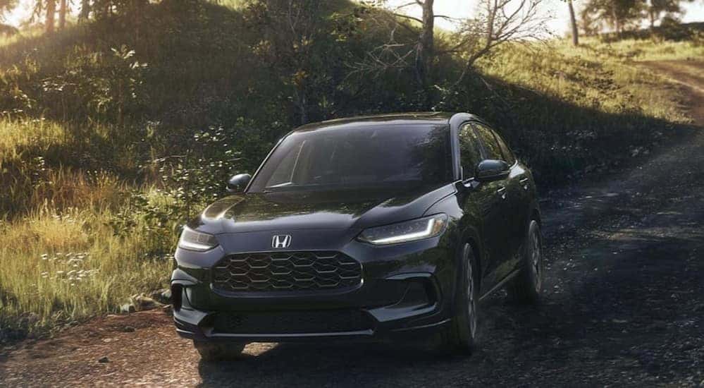 Gray 2027 Honda HR-V driving offroad.