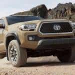 2019 Toyota Tacoma V6 towing in a desert landscape