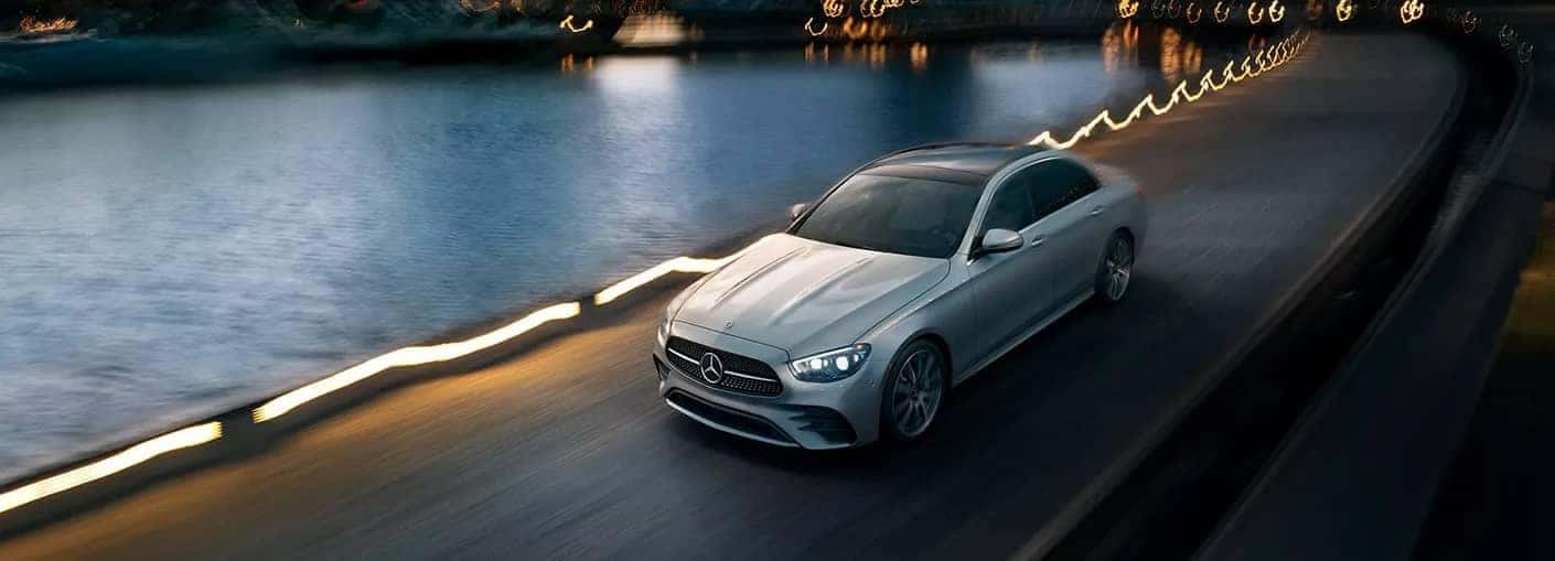 2023 Mercedes-Benz E-Class driving on a bridge