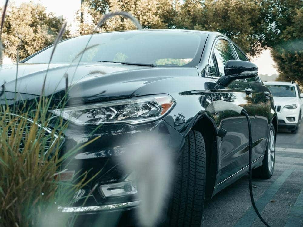 Car charging at a local EV station