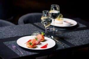Plated food with wine served at an elegant restaurant