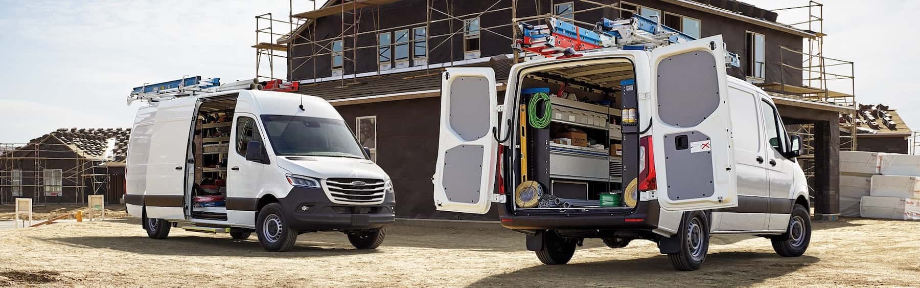 Mercedes-Benz service vans at a work site