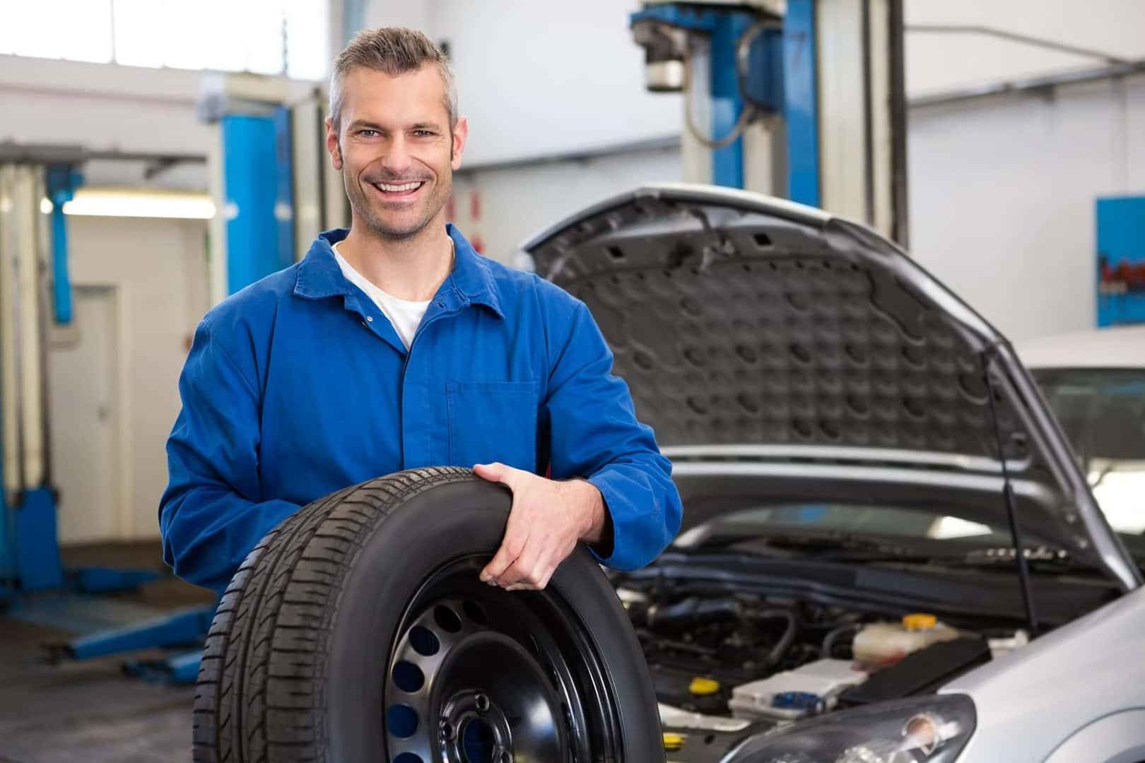 Technician Repairing Tire near West Covina CA