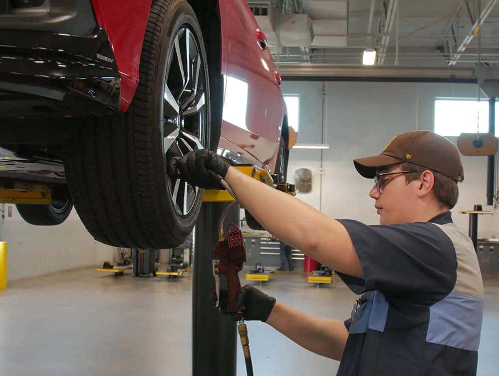 man working on tire