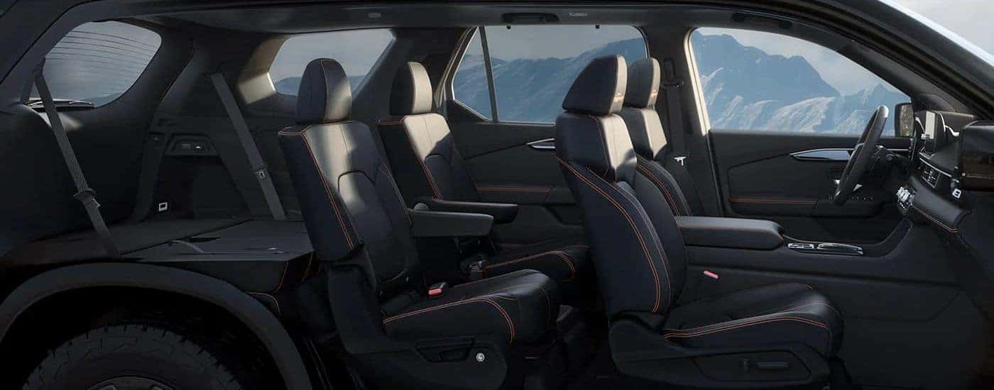 The black interior is shown in a 2023 Honda Pilot.