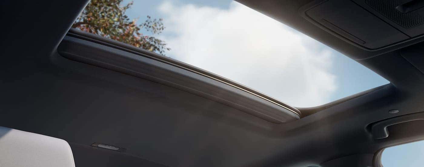 A close-up of the sunroof in a 2024 Honda CR-V Sport Touring Hybrid is shown.