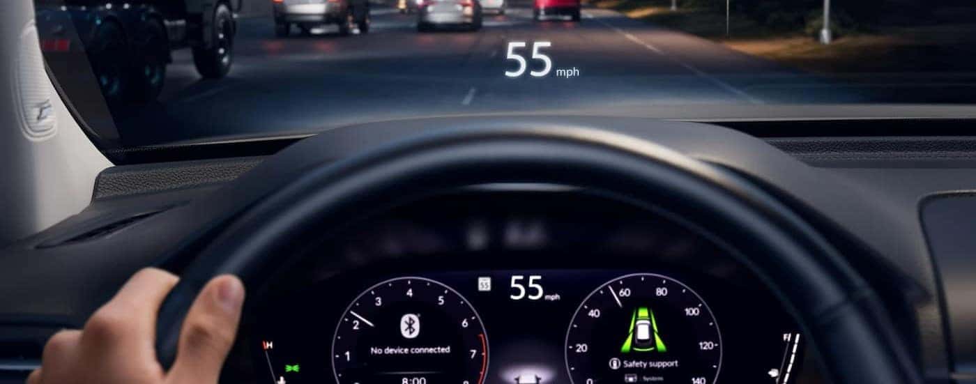 A close-up of the digital dash display is shown in a 2025 Honda Pilot for sale.