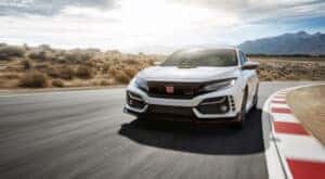 A white 2021 Honda Civic Type R is shown on a race track after leaving a Honda dealer near Irving.