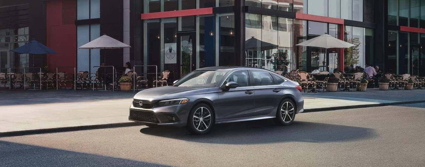 A grey 2025 Honda Civic is shown after leaving a Honda dealer near Southlake.