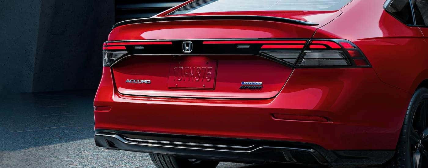 The red rear bumper on a 2025 Honda Accord Touring Hybrid for sale near Irving.