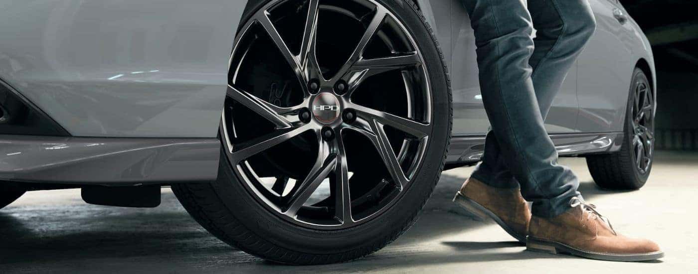 Close-up on the wheel of a grey 2024 Honda Accord HPD.