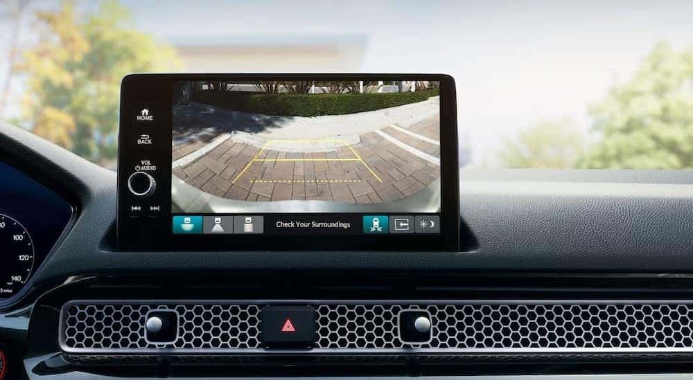 Close-up of an infotainment screen in a 2025 Honda Civic for sale.