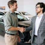 Two people shaking hands.