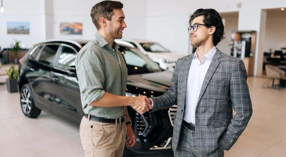 Two people shaking hands.