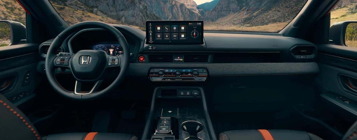 Infotainment and digital gauge cluster on a 2026 Honda Passport for sale