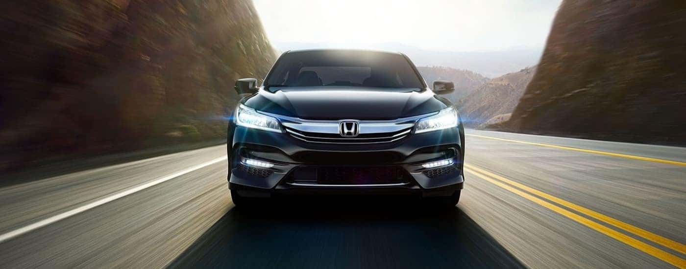A blue 2017 Honda Accord for sale near Keller driving on a highway.