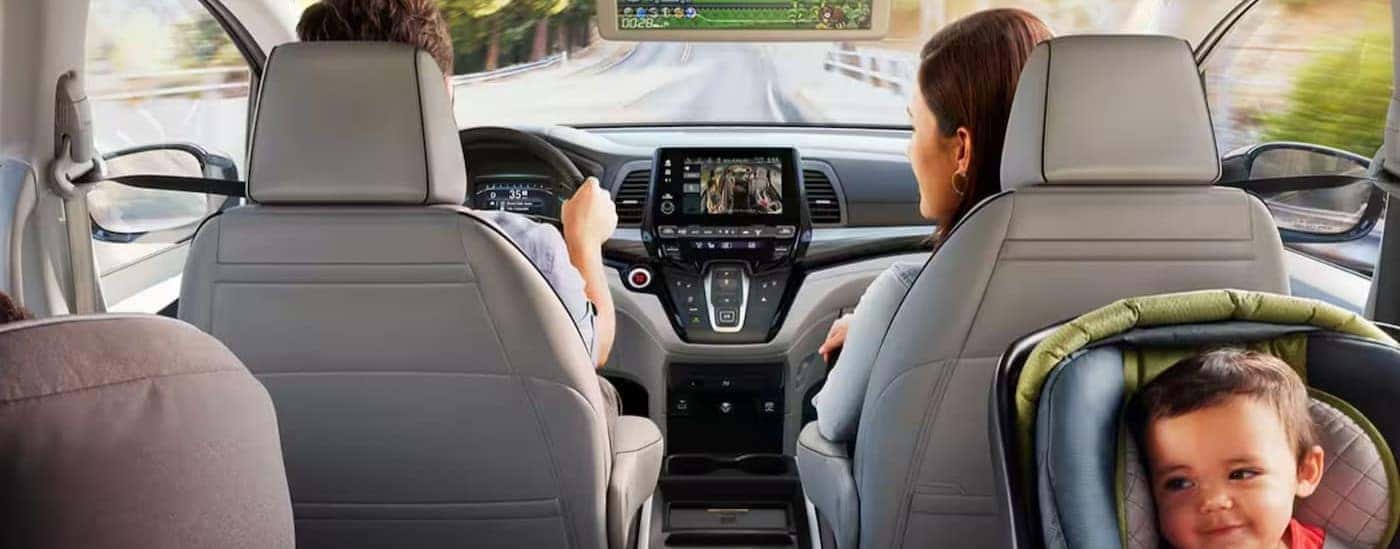The gray interior and dash in a 2024 Honda Odyssey.
