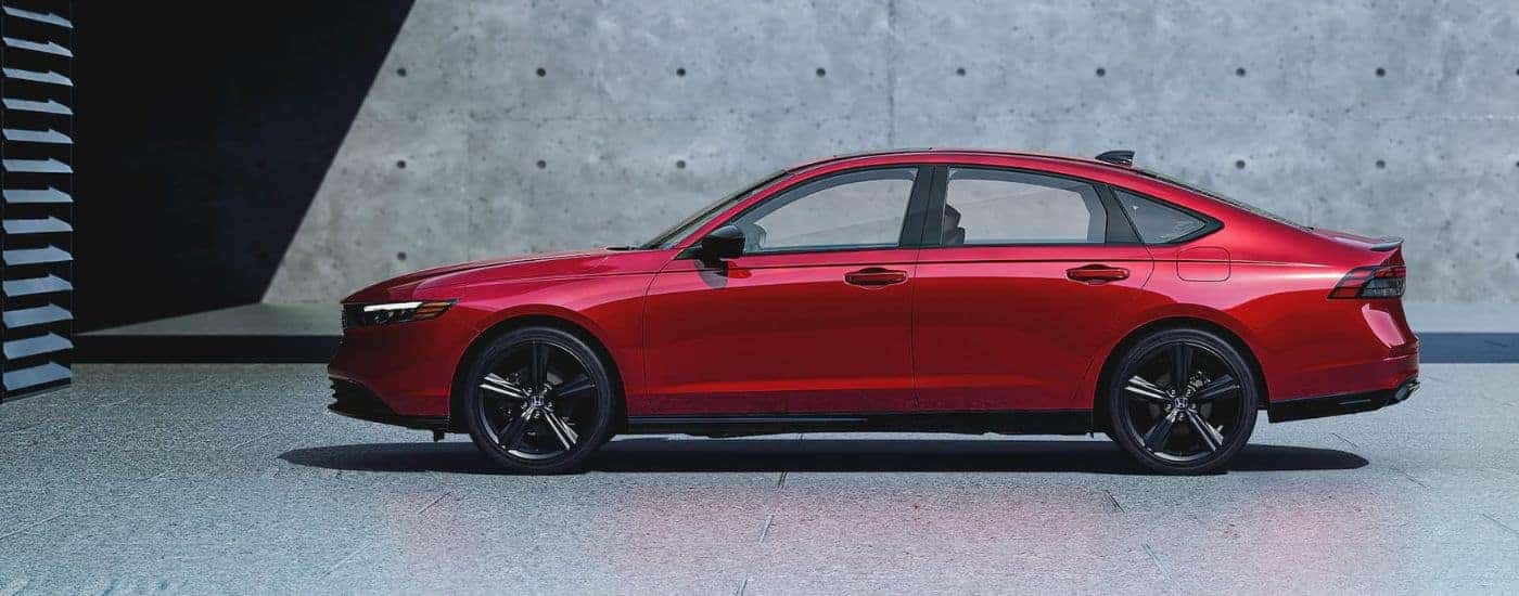 Red 2024 Honda Accord for sale near Newark parked in front of a wall