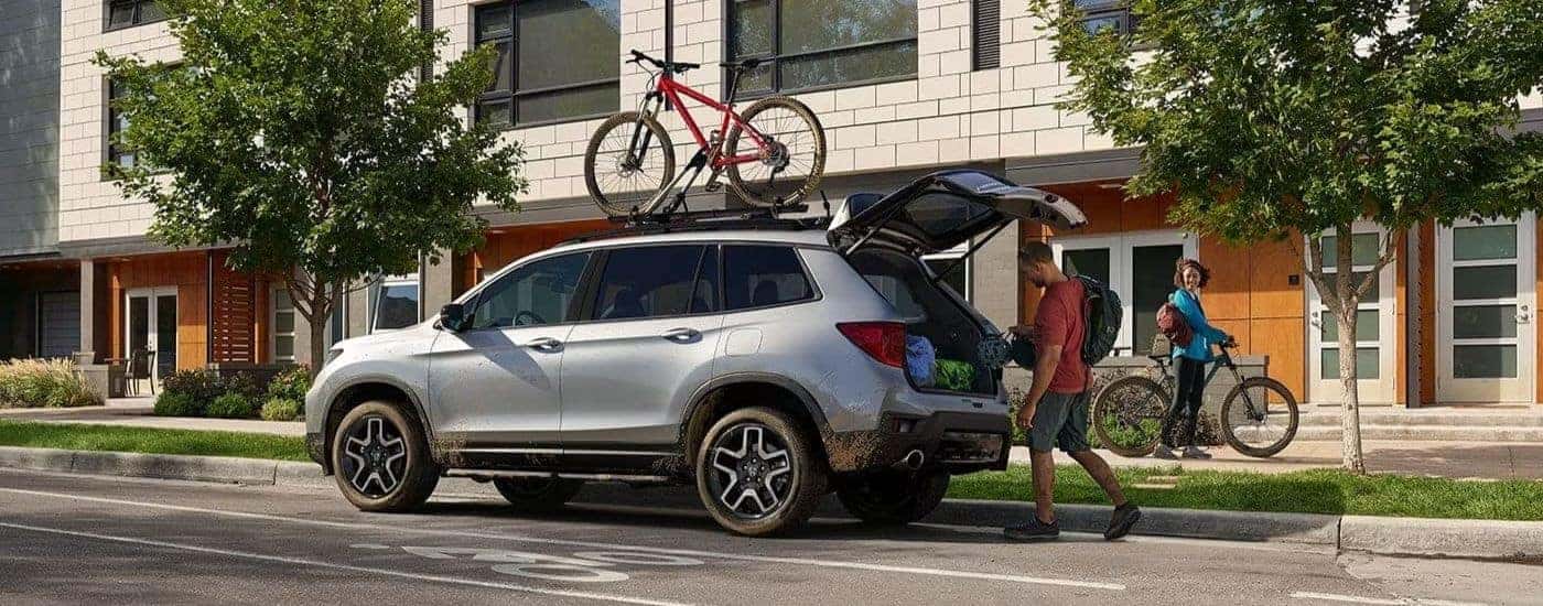 A silver used 2023 Honda Passport Elite for sale near Fort Worth